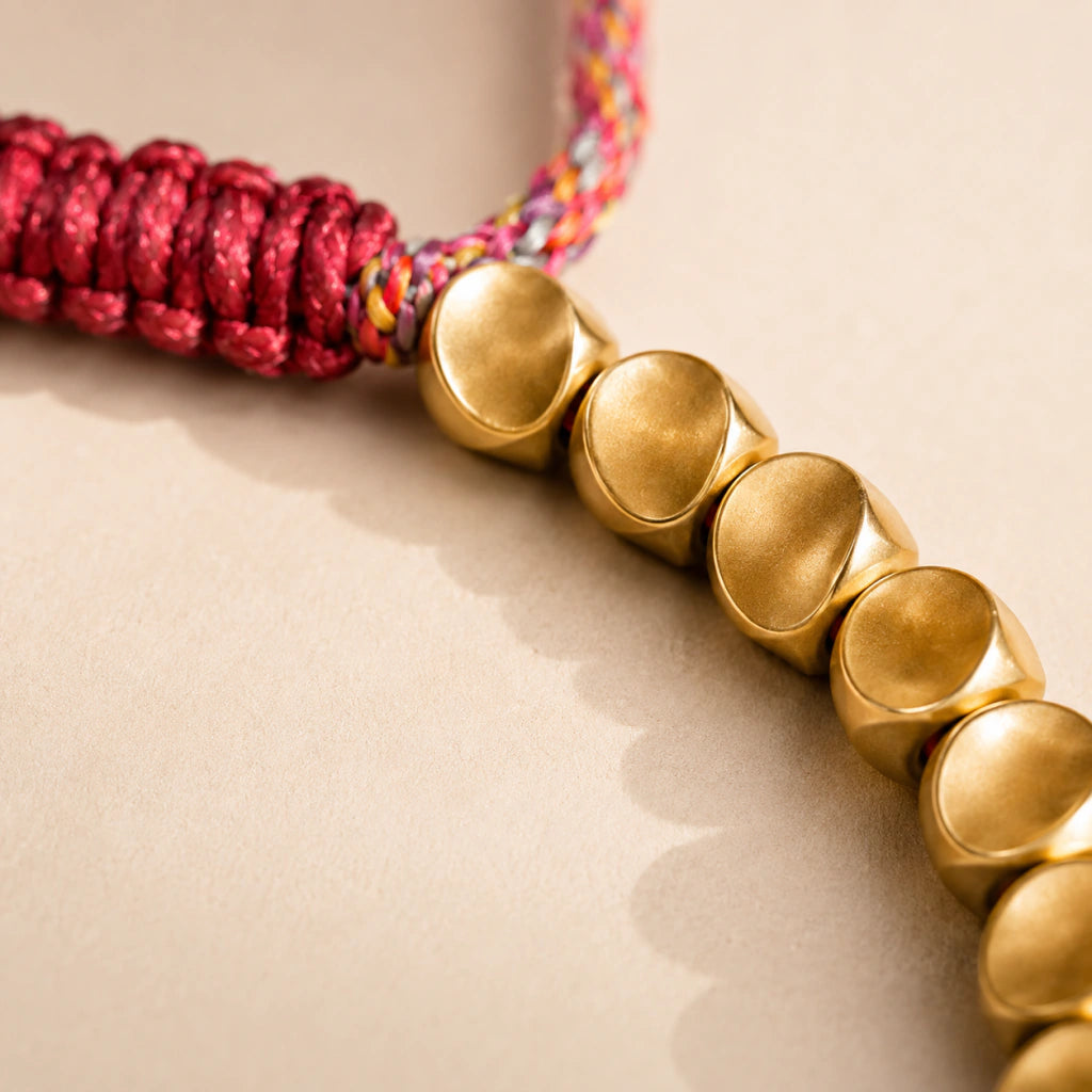 Pulsera Tibetana de la Fortuna con su cordón trenzado multicolor